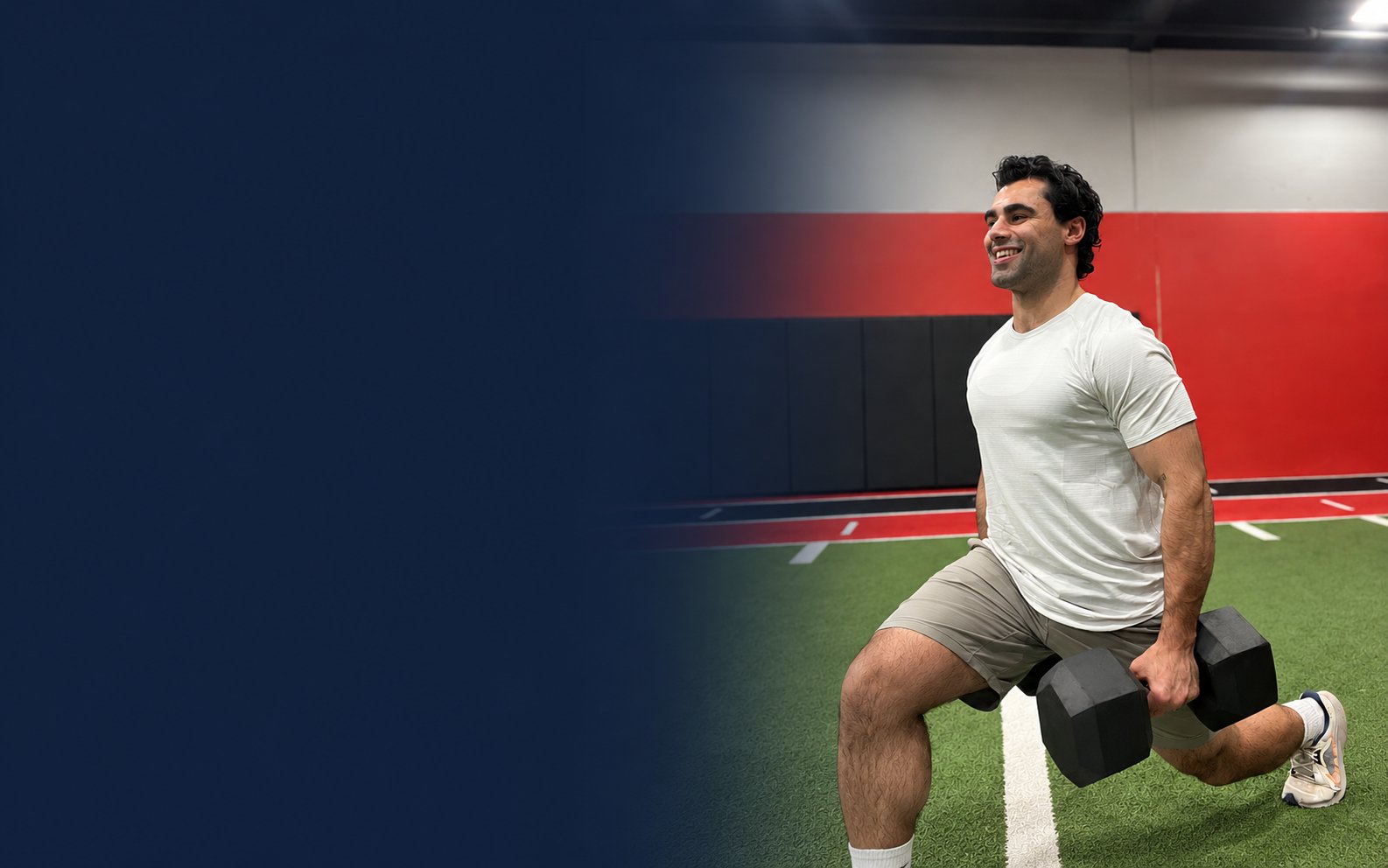 Coach Ali performing a dumbbell lunge in the gym